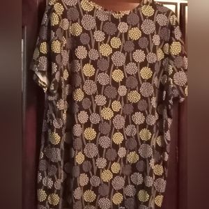 Plus size women's shirt. Dark blue background with light blue/white pattern